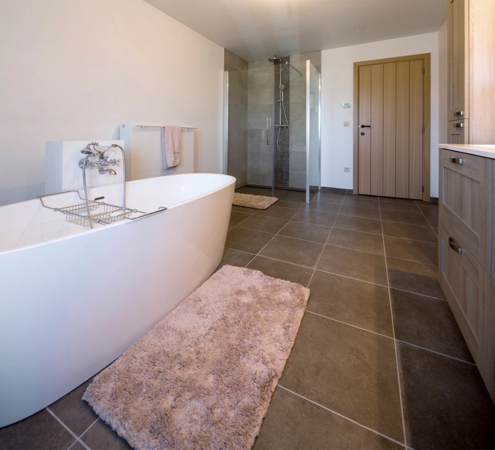 Remodeled Port St. Lucie bathroom with a freestanding tub
