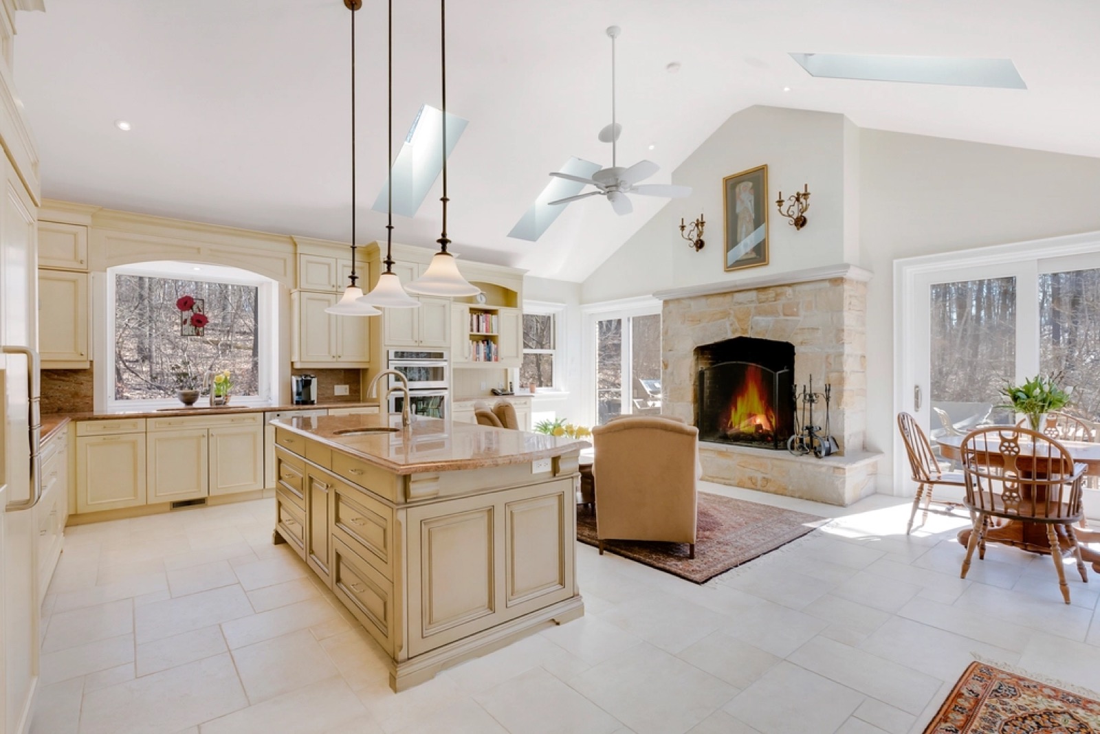 Open-plan Port St. Lucie kitchen with a large island and fireplace